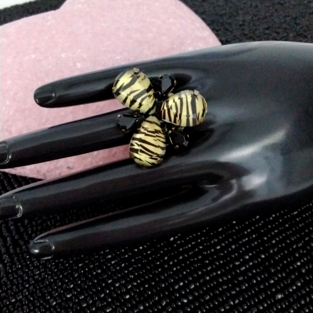 Zebra print ring with bronze tone adjustable band